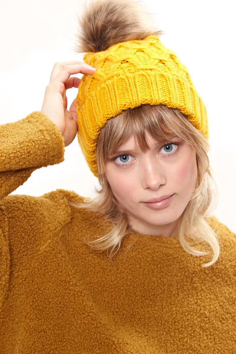 Louche Shauna Cable Knitted Beanie With Faux Fur Bobble - Mustard - Front