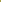 A close-up of a textured fabric in a muted olive yellow-green color.