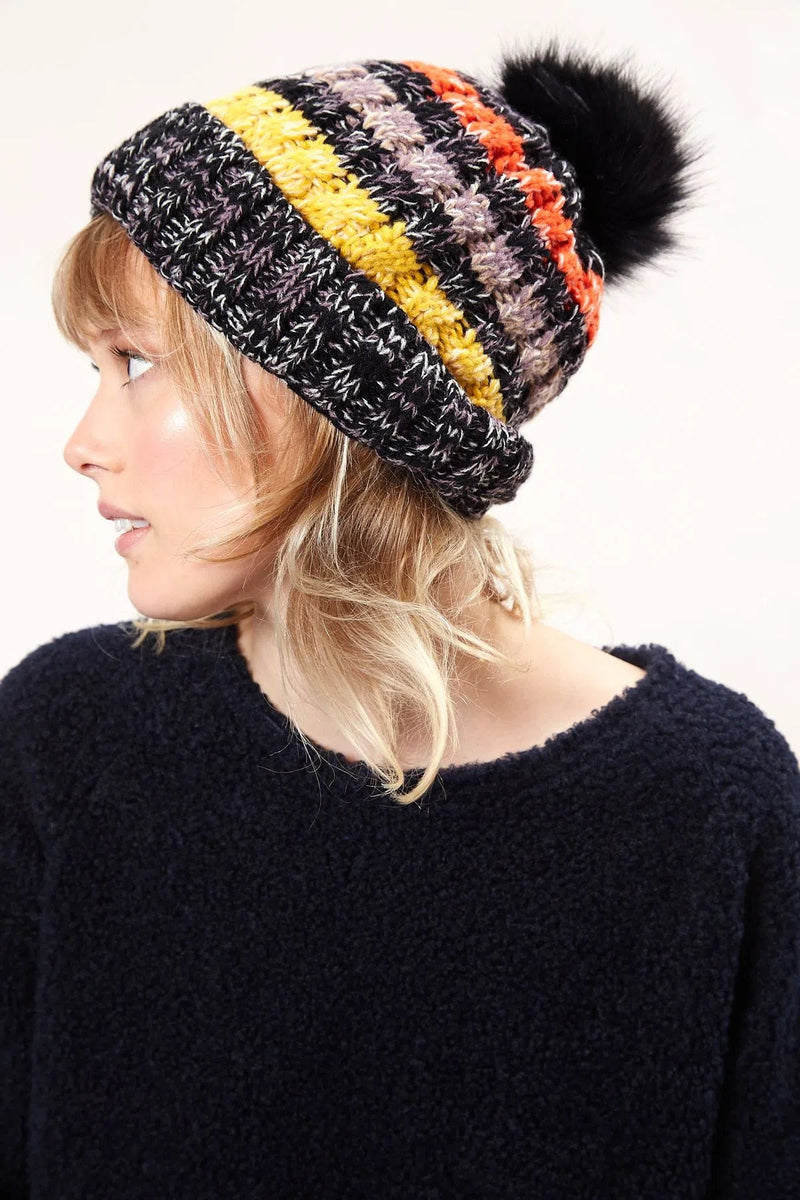 Louche Orla Striped Knitted Beanie With Faux Fur Bobble - Black - Front